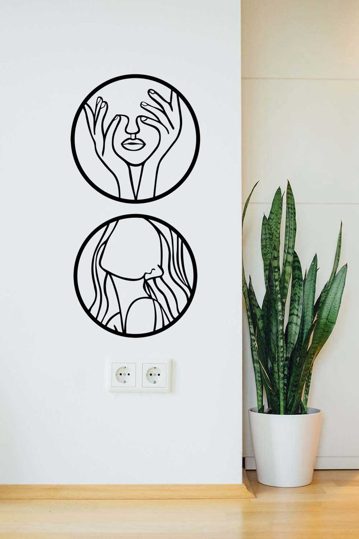 Duvardan 2 cm önde konumlanarak soyut yüz hatlarını gölge oyunlarıyla canlandıran, yaşayan bir boyuta sahip 3D derinlik etkili ikili metal duvar eseri.